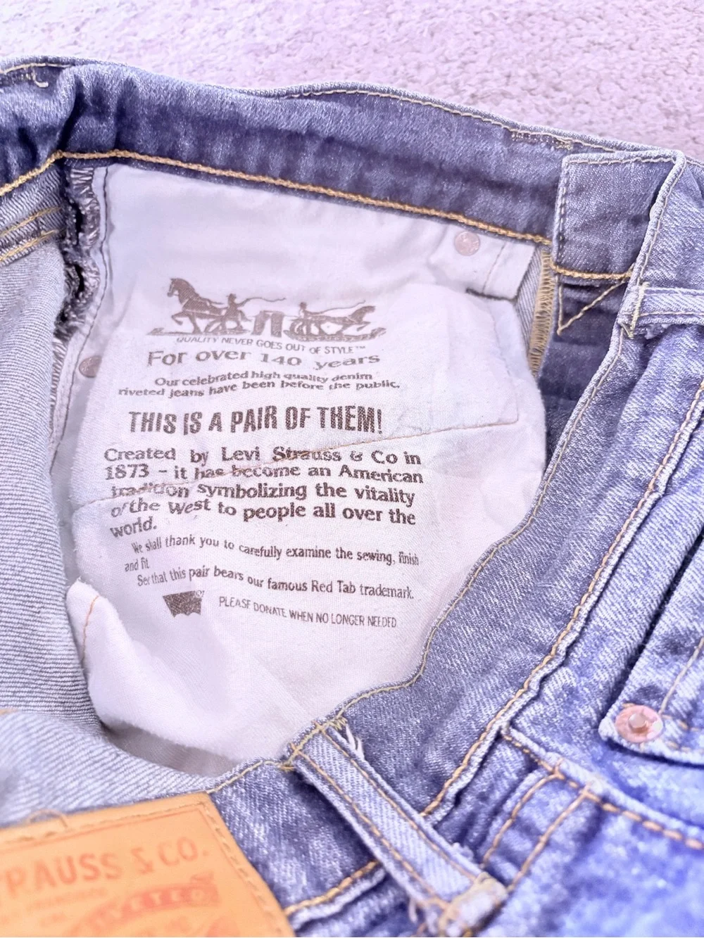 Levi's light blue denim shorts with frayed hem